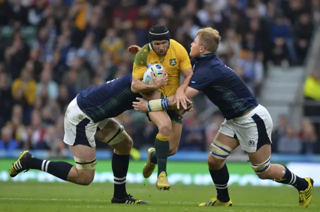 Matt Giteau is tackled