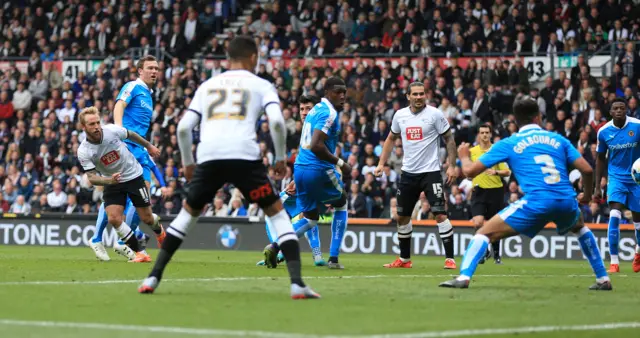 Johnny Russell scores