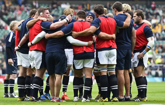 Scotland players in a huddle