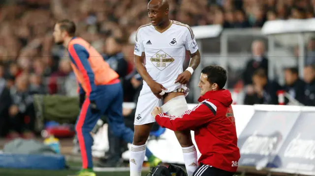 Andre Ayew receives medical treatment