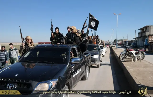 Fighters from the self-styled Islamic State militant group in the Iraqi city of Mosul