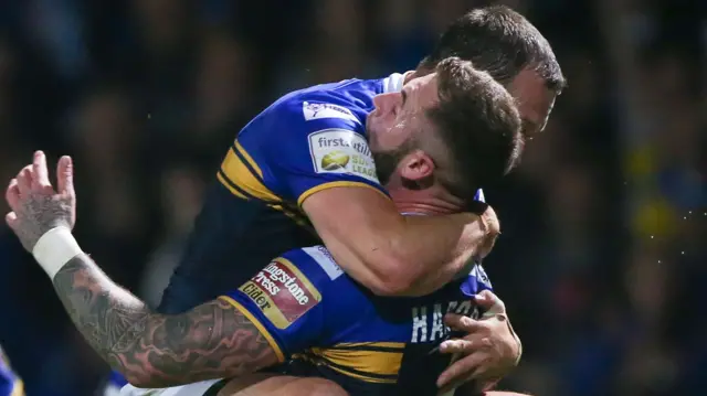 Zak Hardaker celebrates Leeds' try