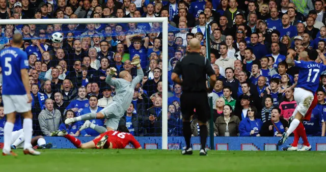 Tim Cahill (right) scores for Everton in a win over Liverpool