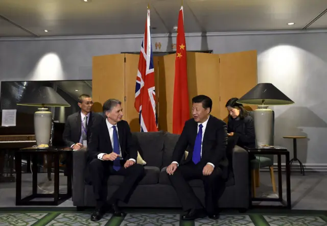 Philip Hammond and Xi Jinping