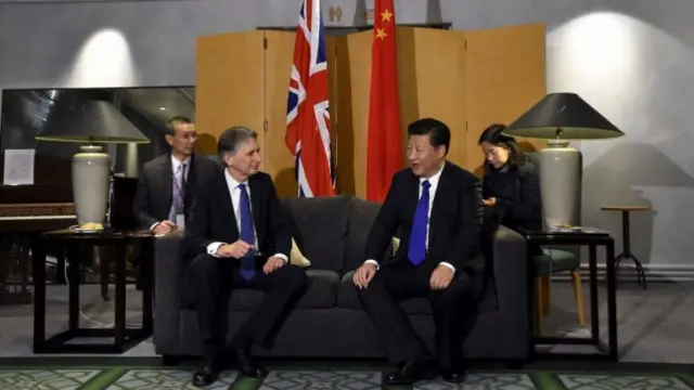 Defence Secretary Philip Hammond and Chinese President Xi Jinping