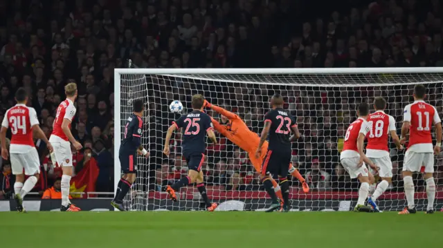 Arturo Vidal has a shot saved by Arsenal's Petr Cech