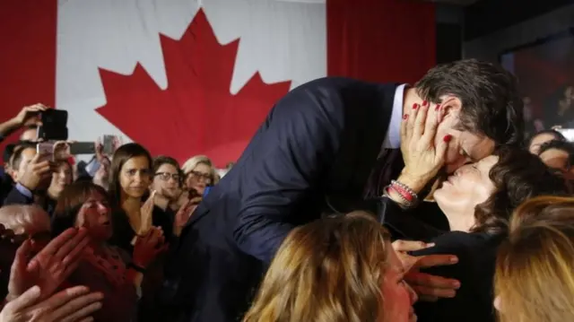 Justin Trudeau is congratulated by his mother Margaret after the Liberal victory