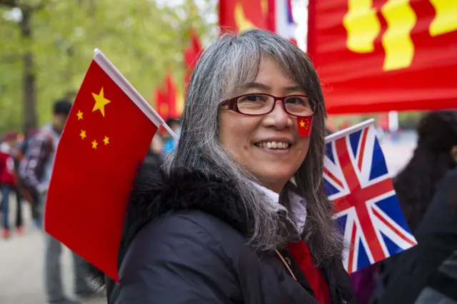 Chinese woman with flags