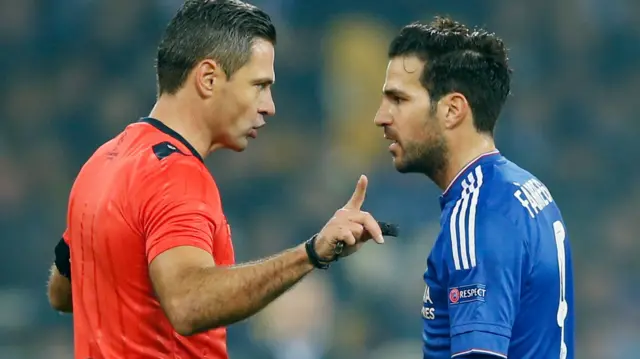 Cesc Fabregas speaks to the referee