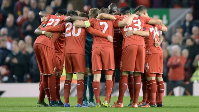 Liverpool team huddle