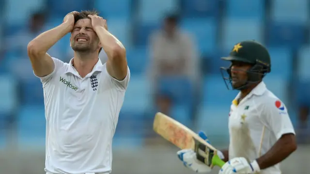 Mark Wood (left) frustrated