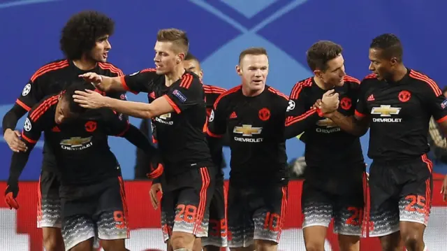 Manchester United players celebrate