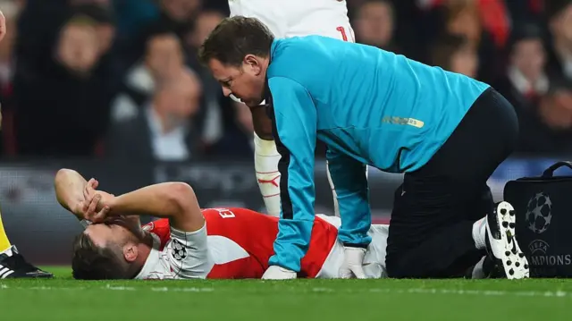 Aaron Ramsey receives treatment