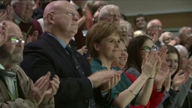 SNP leader Nicola Sturgeon leads the applause for Leanne Wood