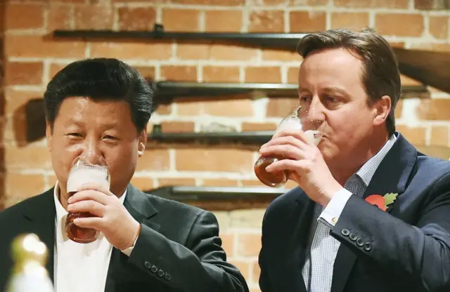 President Xi Jinping and David Cameron sharing a pint in a pub in Buckinghamshire on Thursday