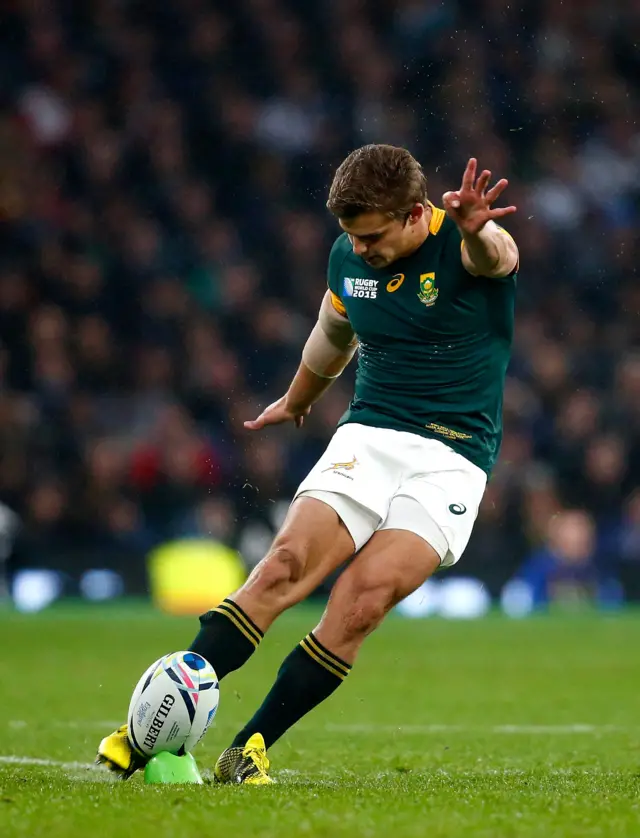 Pat Lambie of South Africa kicks a penalty