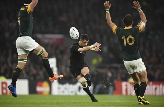 Dan Carter scores a drop goal