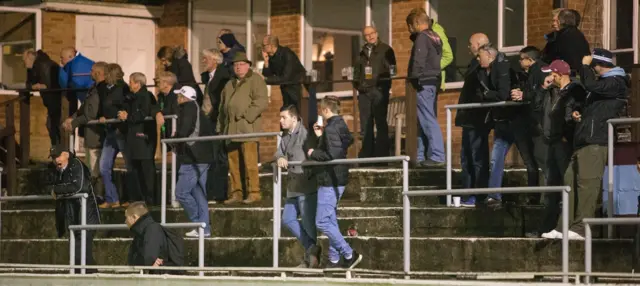 Chesham FC supporters watch their team in action at The Meadow ground