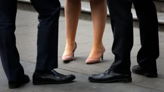 Businessmen and women's feet