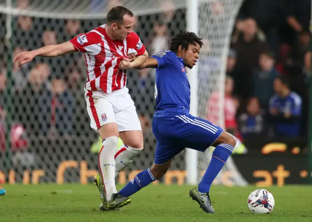 Stoke's Charlie Adam and Chelsea's Loic Remy