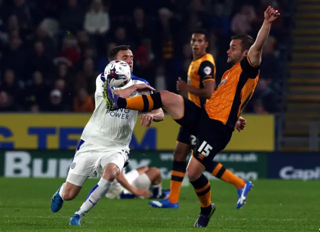 Andy King and Shaun Maloney compete for the ball