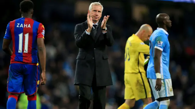 Alan Pardew applauds