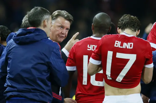 Louis van Gaal speaks to Ashley Young