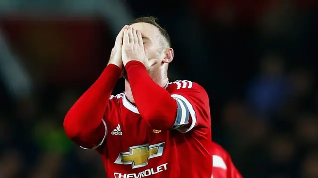 Wayne Rooney reacts