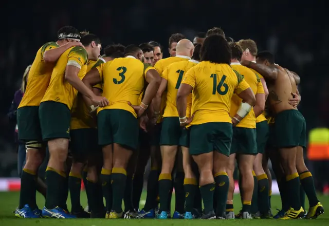 Australia players celebrate at the end of the match