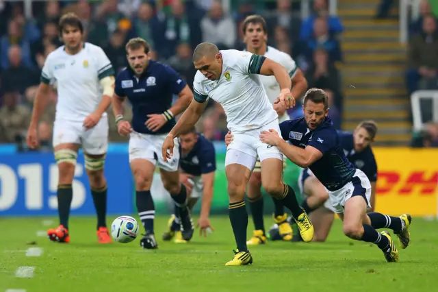 Scotland's Greig Laidlaw brings down Bryan Habana