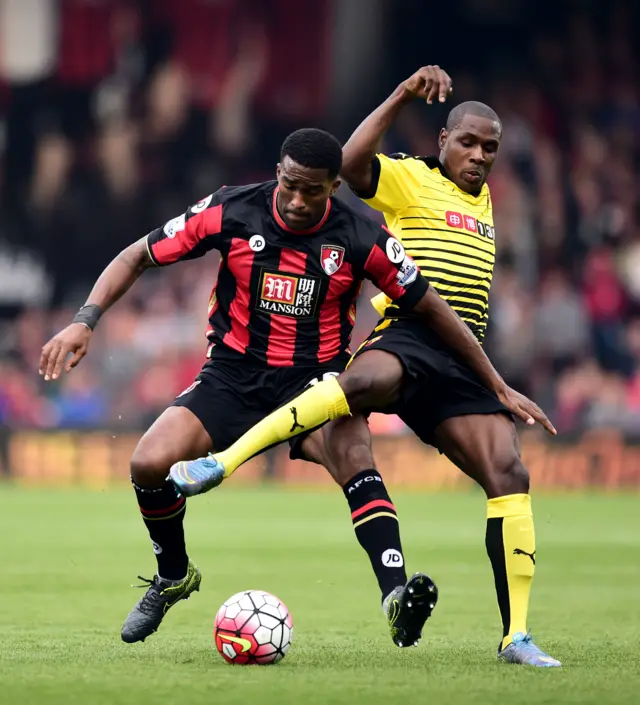 Distin and Ighalo challenge for the ball