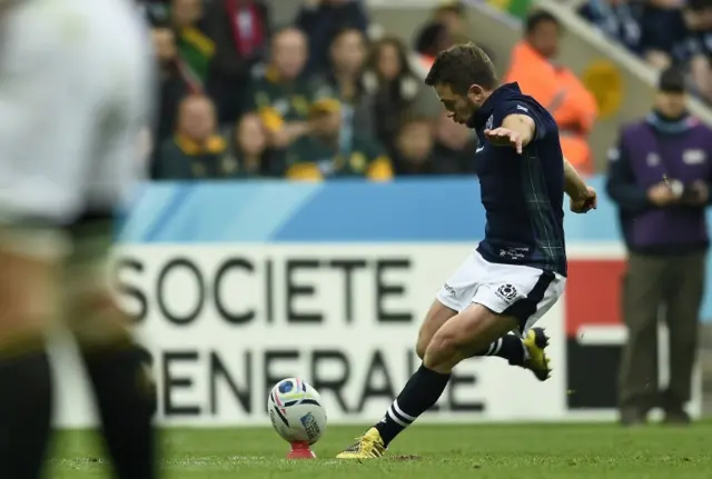 Scotland's scrum half and captain Greig Laidlaw kicks a penalty