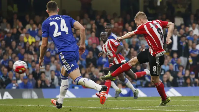 Steven Davis volleys the ball towards goal