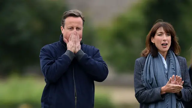 David Cameron watches a game of grassroots football