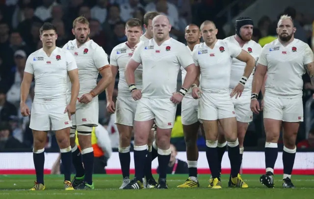 The England side look dejected