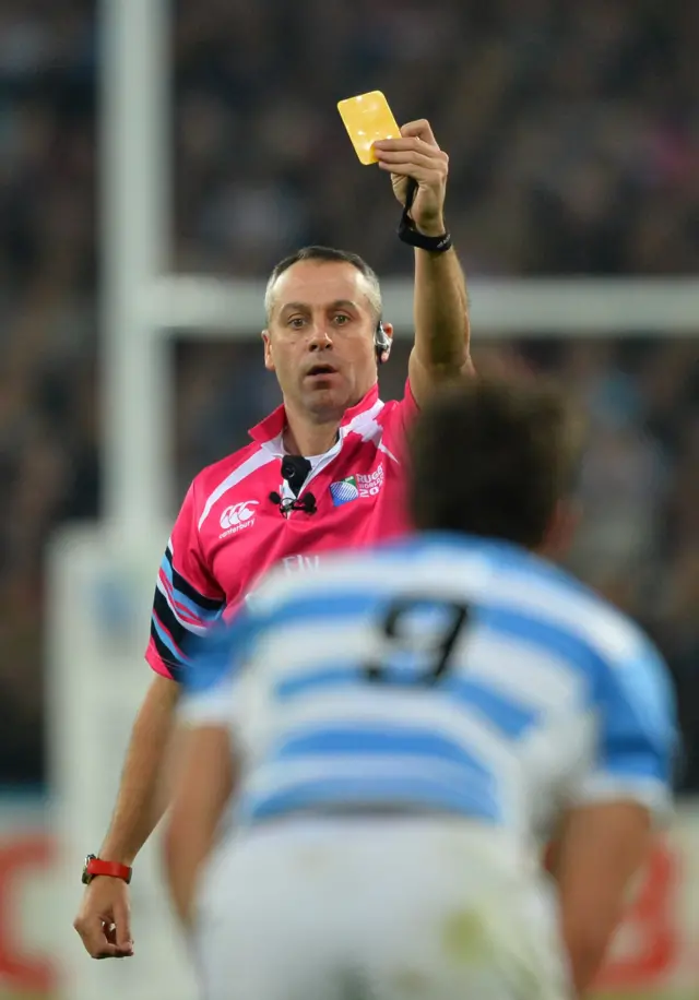 Tomas Cubelli receives a yellow card