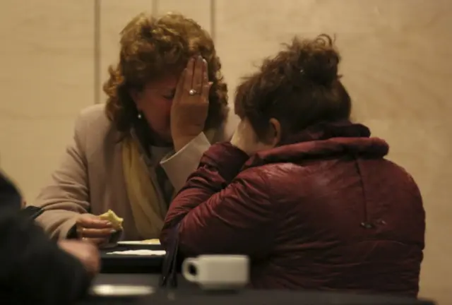 Relatives of victims of a Russian airliner which crashed in Egypt, mourn at a hotel near Pulkovo airport in St. Petersburg, Russia,on 31 October 2015.