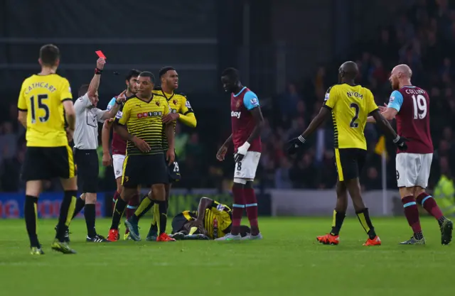 James Collins is shown the red card