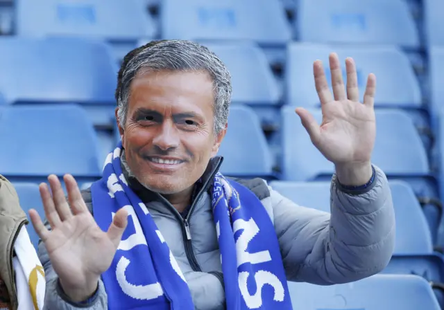 A Chelsea fan in a Jose Mourinho mask