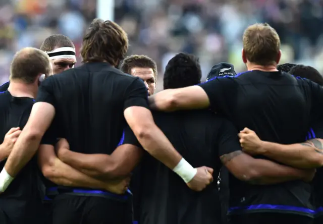 New Zealand's players in a huddle