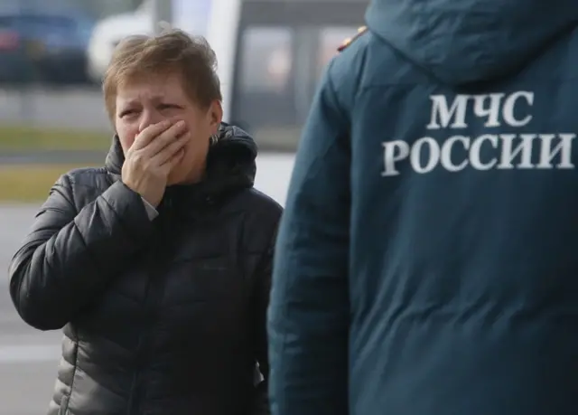 A relative of the victims reacts at Pulkovo airport in St.Petersburg, Russia, on 31 October 2015