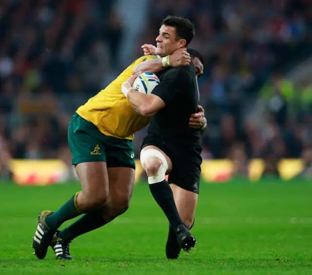 Dan Carter is tackled high by Kepu