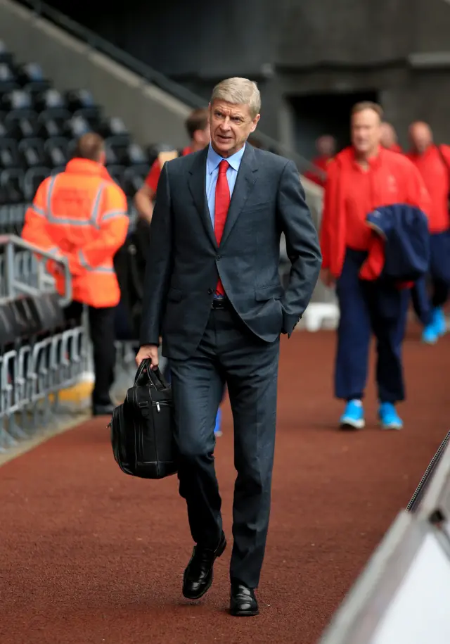 Arsene Wenger arrives for the match against Swansea