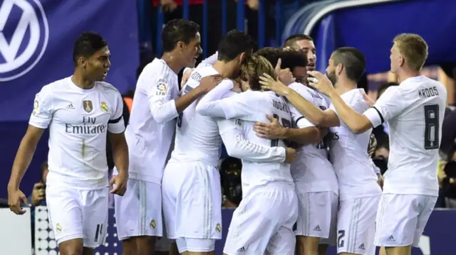 Real Madrid celebrate their opening goal