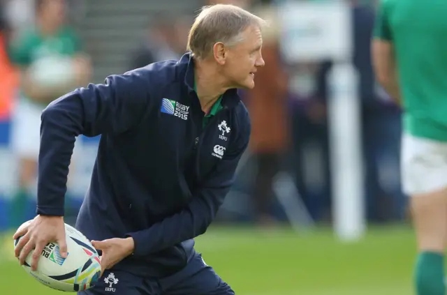 Ireland coach Joe Schmidt takes part the in warm-up at the Olympic Stadium