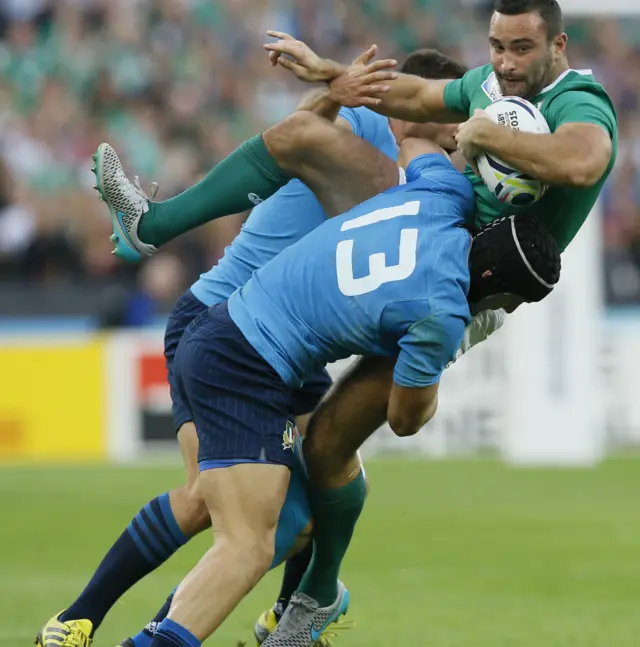 Ireland's Dave Kearney is tackled