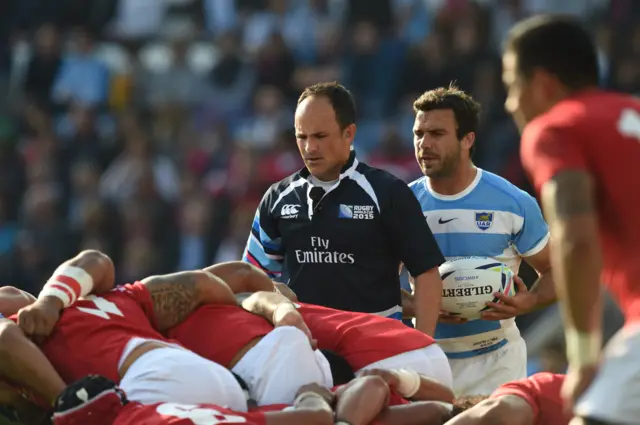 Referee Jaco Peyper looks on at a scrum