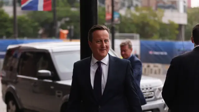 David Cameron arrives at the Conservative party conference