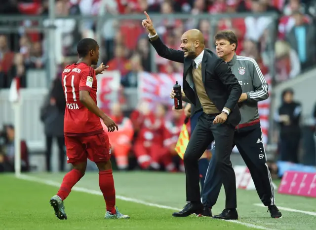 Douglas Costa and Pep Guardiola