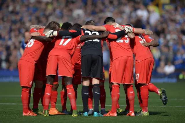 Liverpool team huddle